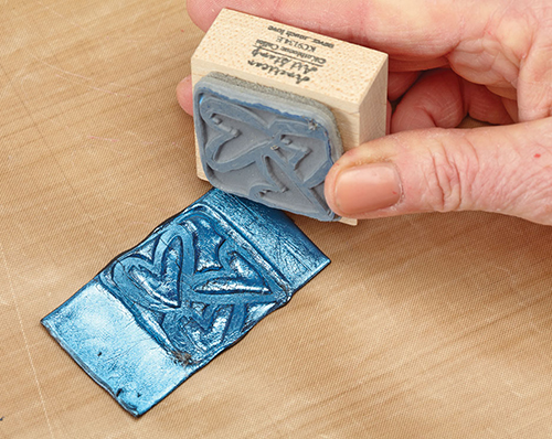 Stamping on moldable plastic, from the book Mixed Media in Clay