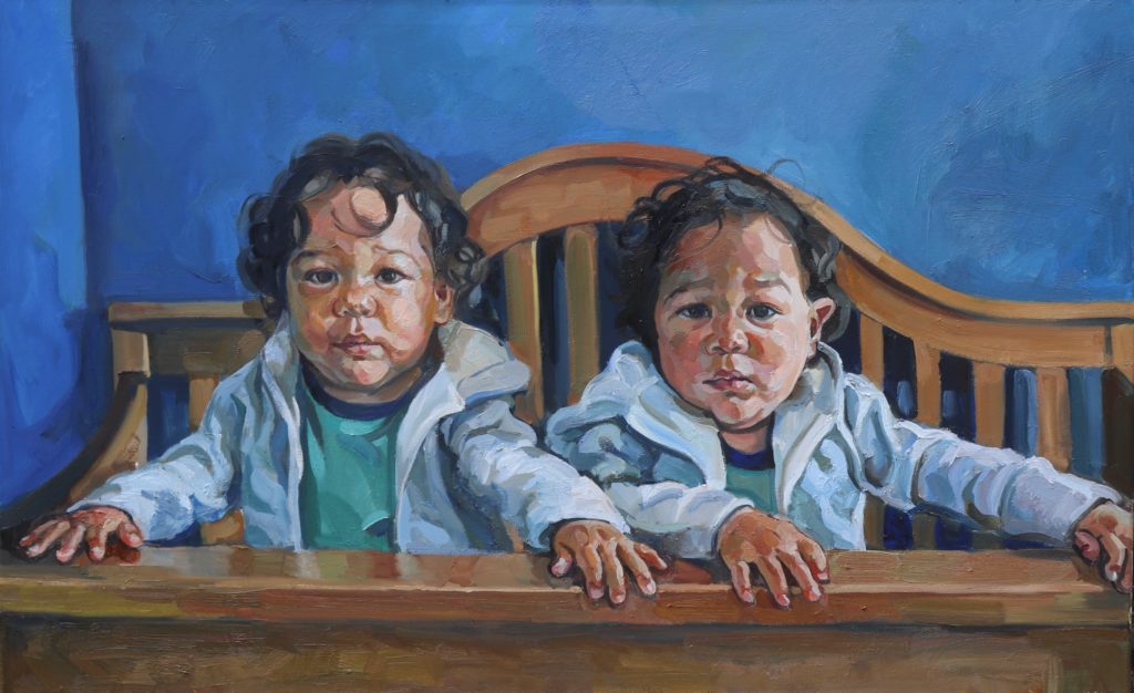 Painting a portrait of twin toddlers.